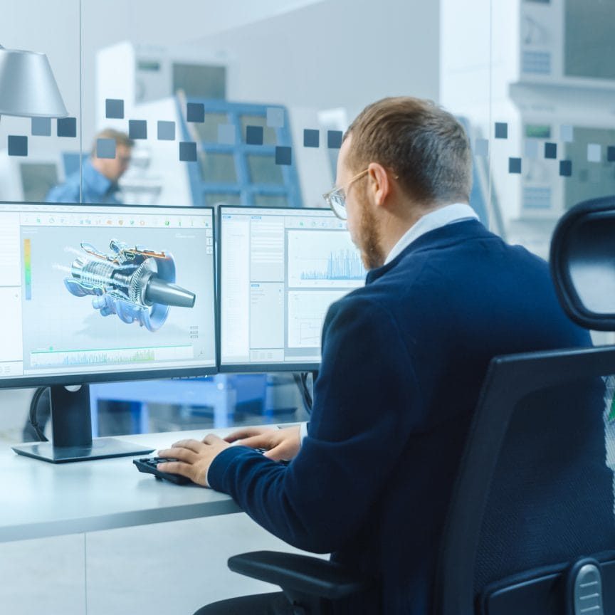 Industrial Engineer Working on a Personal Computer, Two Monitor Screens Show CAD Software with 3D Prototype of Hybrid Electric Engine and Charts. Working Modern Factory.