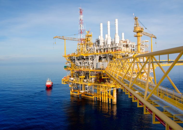 Offshore construction platform for production oil and gas. Oil and gas industry and hard work. Production platform and operation process by manual and auto function from control room.