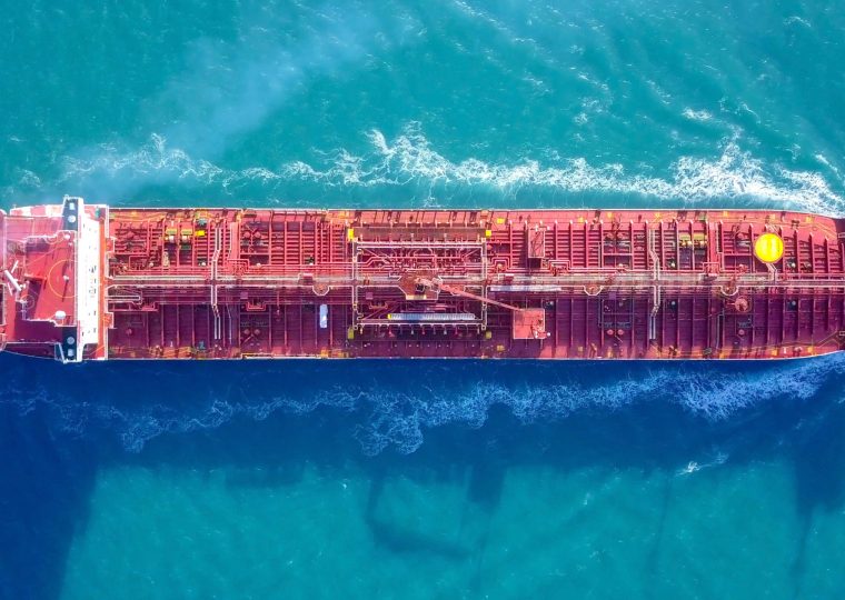 Large crude oil tanker roaring across The Mediterranean sea - Aerial image.